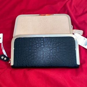 Brand new clutches black and nude $25 each